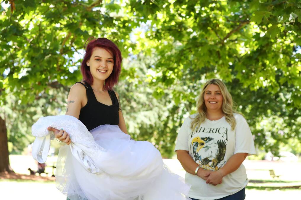 ONE BRIDE TO THE NEXT: Tanya-Lee Dawson is thrilled that Paige Starr chose to pass on her wedding dress to her. Picture: Emma Hiller 