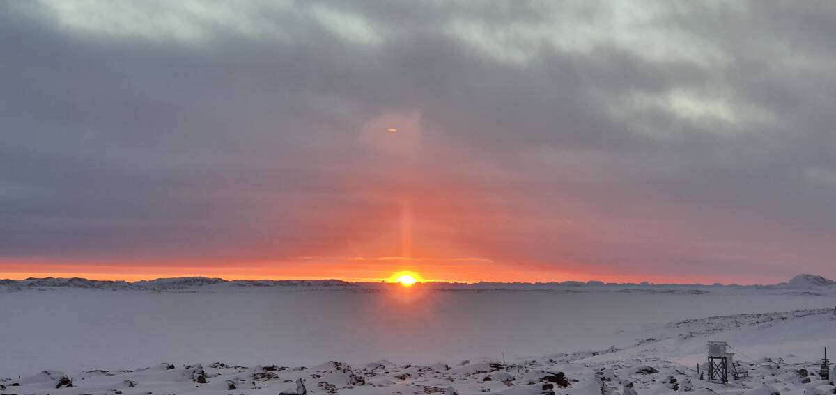 STUNNING OUTLOOK: Will captures a shot of a sunset that takes Antarctica into a 24-hour night. More recently, expeditioners saw their last sunset for five weeks. 