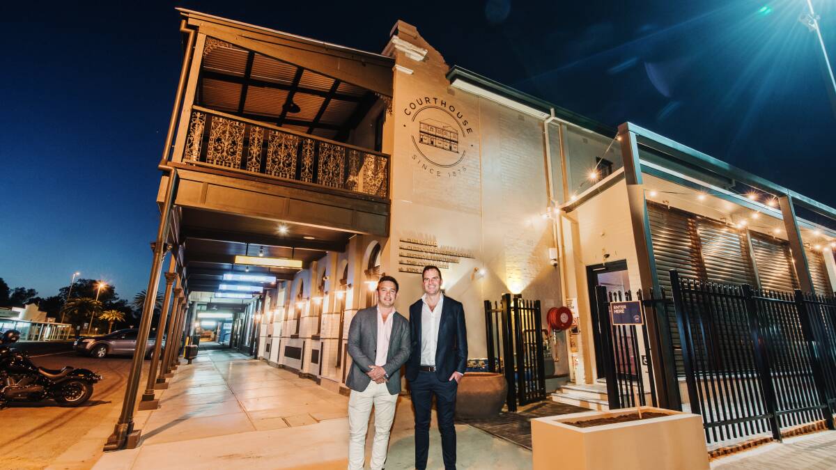 REGIONAL LIVING: Harvest Hotels directors Fraser Haughton and Chris Cornforth outside one of their pubs. Picture: Supplied 