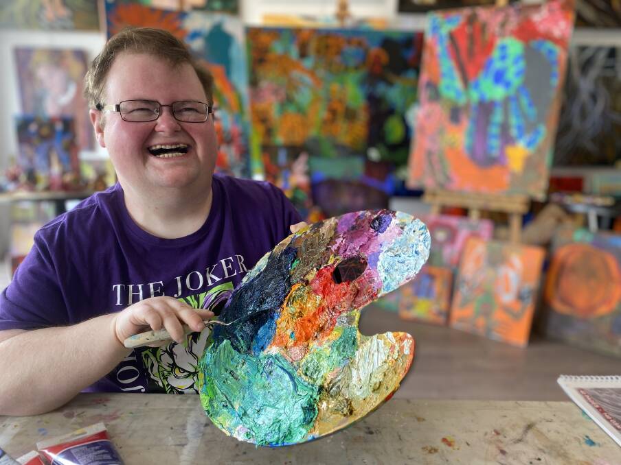 Hayden Watts, 30, says he is so excited to show off to everyone his art that is inspired by his colourful imagination and love of all things spooky. Picture: Annie Lewis 