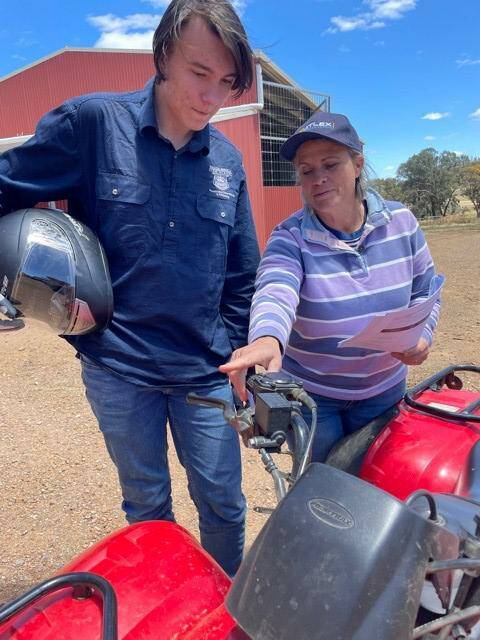 SAFETY MATTERS: Wagga High School student William Evans, 16, with Wagga High primary industries teacher Jane Falepau at a special quad bike safety course at TAFE NSW this week. Picture: Supplied 