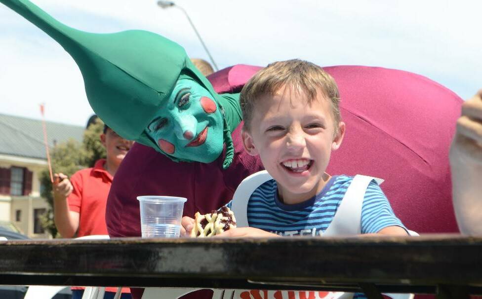 FULL FLAVOUR: Jesse Jewitt, 8, from Young is about to get the fright of his life at last year's Young Cherry Festival, which is on again this weekend.