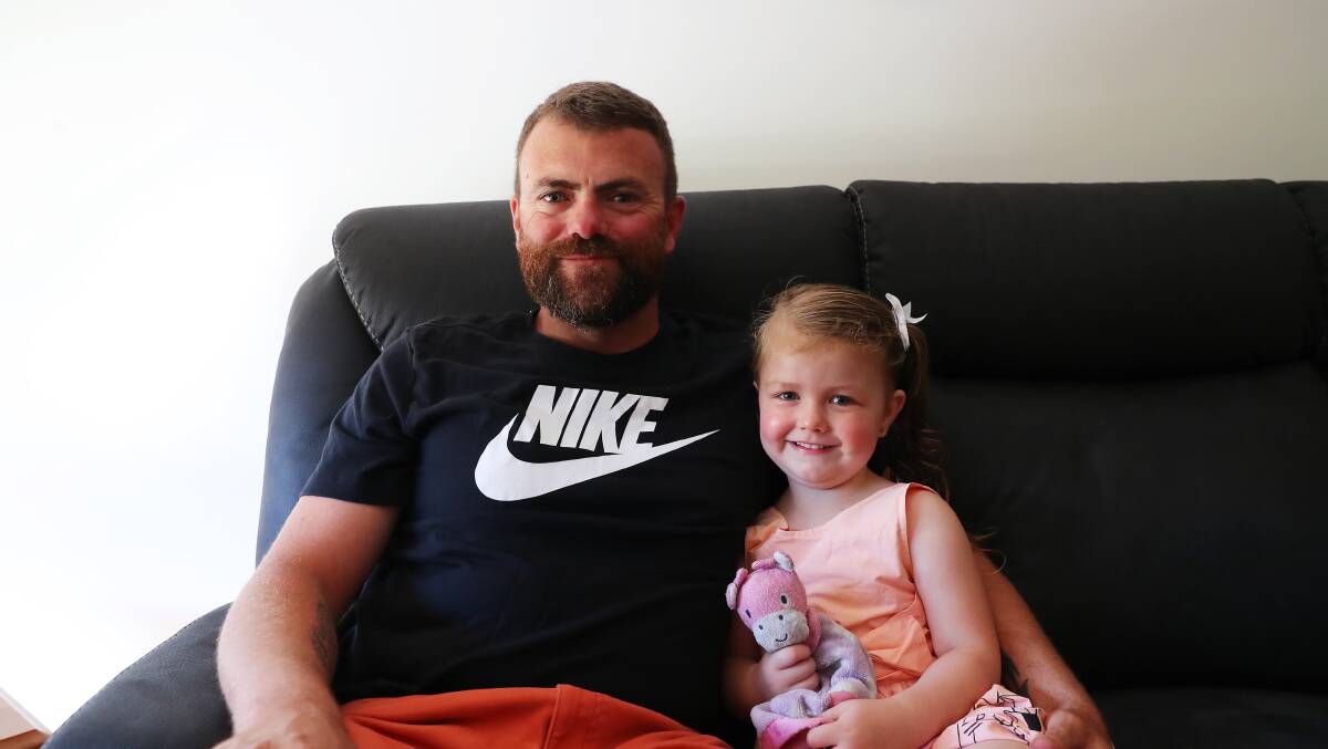 BORDER BOTHER: Three-year-old Ava Shean, pictured with her father Mat, is excited at the prospect of seeing her Queensland-based big sister, Maddi, soon. Picture: Emma Hillier