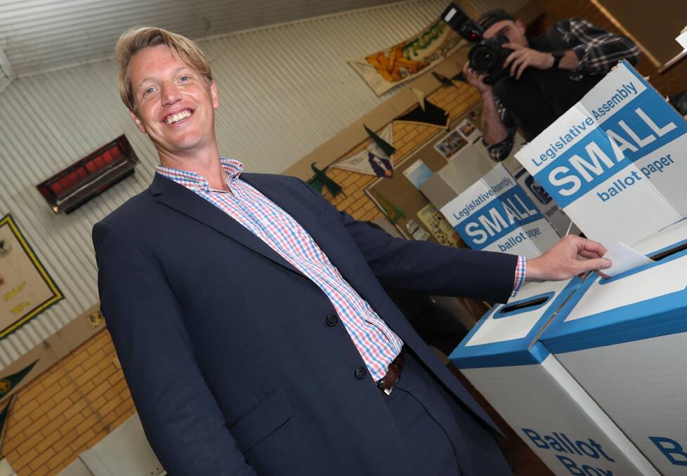 Labor candidate Dan Hayes casts his vote.