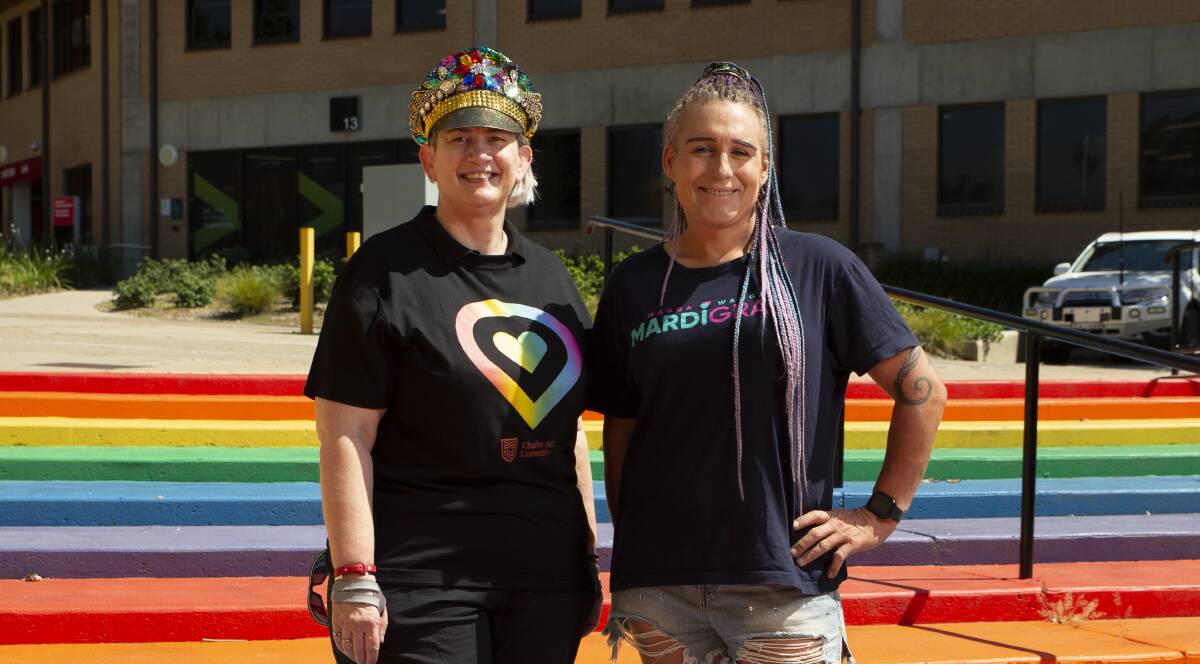 PARTY ON: CSU Associate Professor Cate Thomas with Wagga Mardi Gras founder and organiser Holly Conroy on CSU's rainbow steps. Picture: Madeline Begley