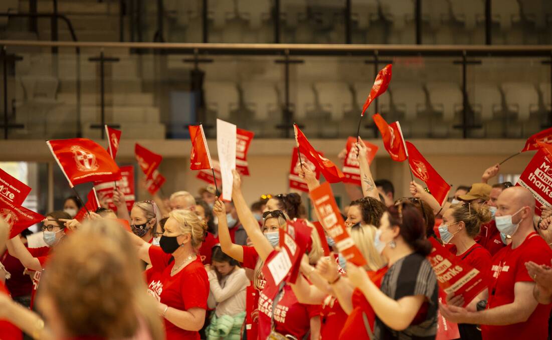 NOT HAPPY: Teachers and their supporters send a message to the government at a rally in Wagga last year. The union has resolved to go on strike for 24 hours next week.