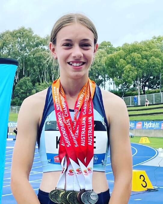 Grace Krause with her medal haul in the Women's Under 16 sprint and jump events at the Australian Track and Field Championships in Sydney
