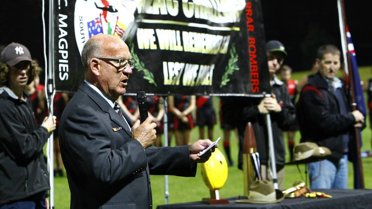 A Vietnam veteran, Bill Jacob addresses the crowd and players before the 2017 Anzac Challenge match at Robertson Oval. Picture: Les Smith
