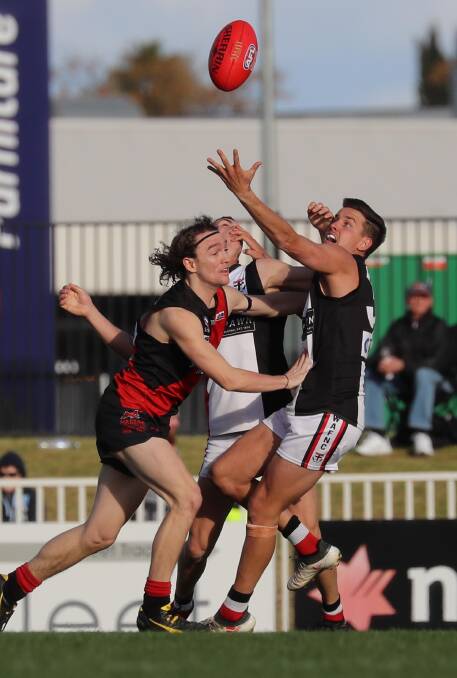 Memorable senior grand final with three goals. Pictures: Les Smith