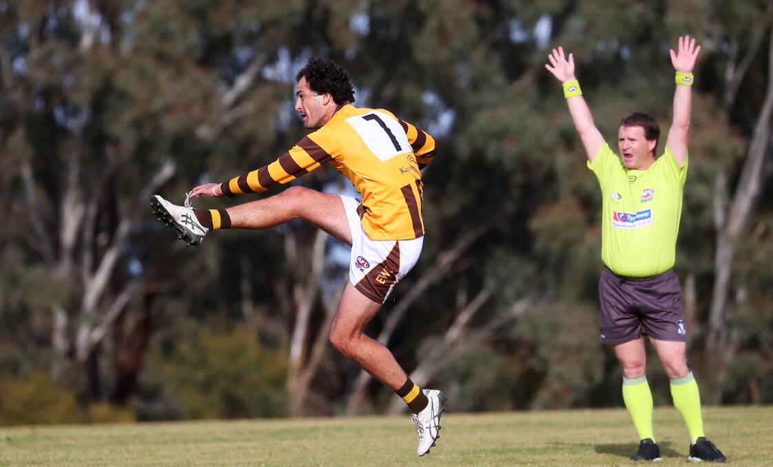 BIG GOALS: East Wagga-Kooringal's Brocke Argus gets a kick at CSU last year. The Hawks remain keen to aim for AFL Riverina's new Premier Division. Argus played for Wagga Tigers in the high-quality AFL Riverina Championship of 2020, which was brought on by COVID-19.