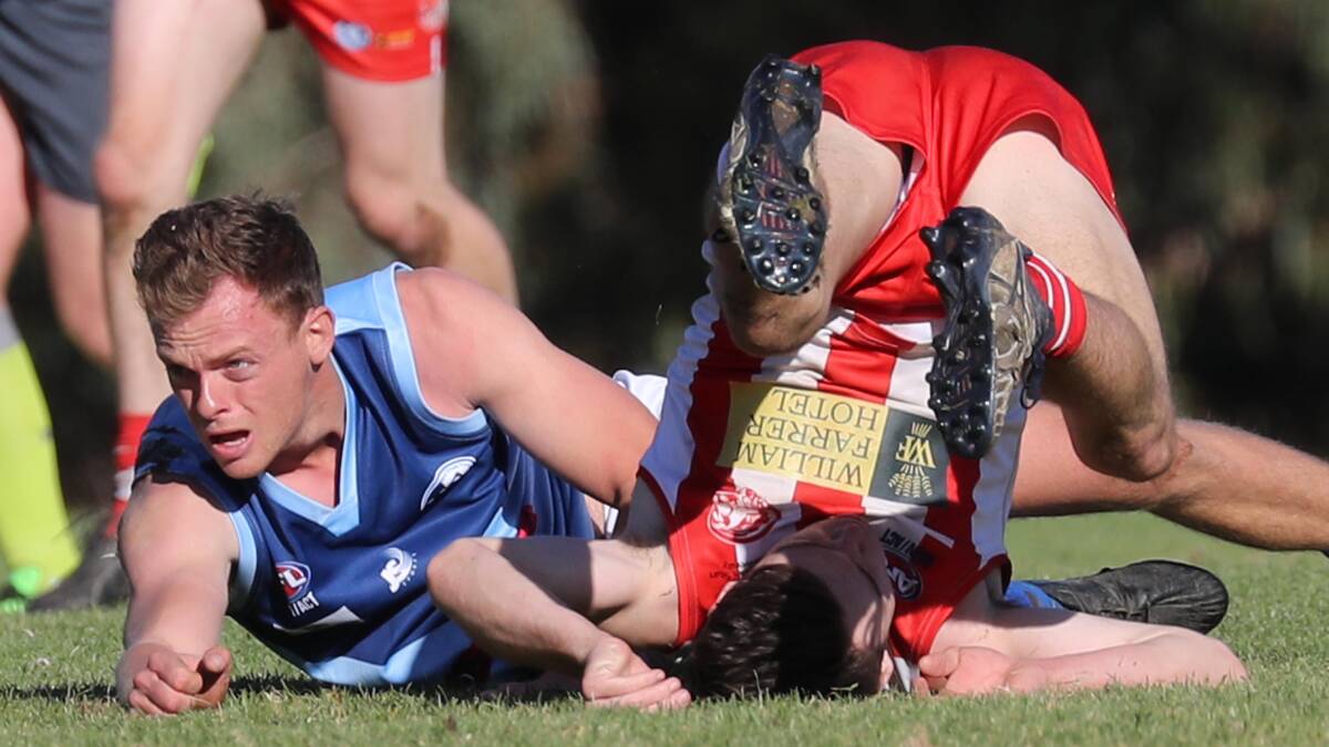 HEAD OVER HEELS: The Bushpigs' emphatic victory against Barellan on Saturday was their first of the season but continued the pain for the Two Blues, who are yet to win this year. 