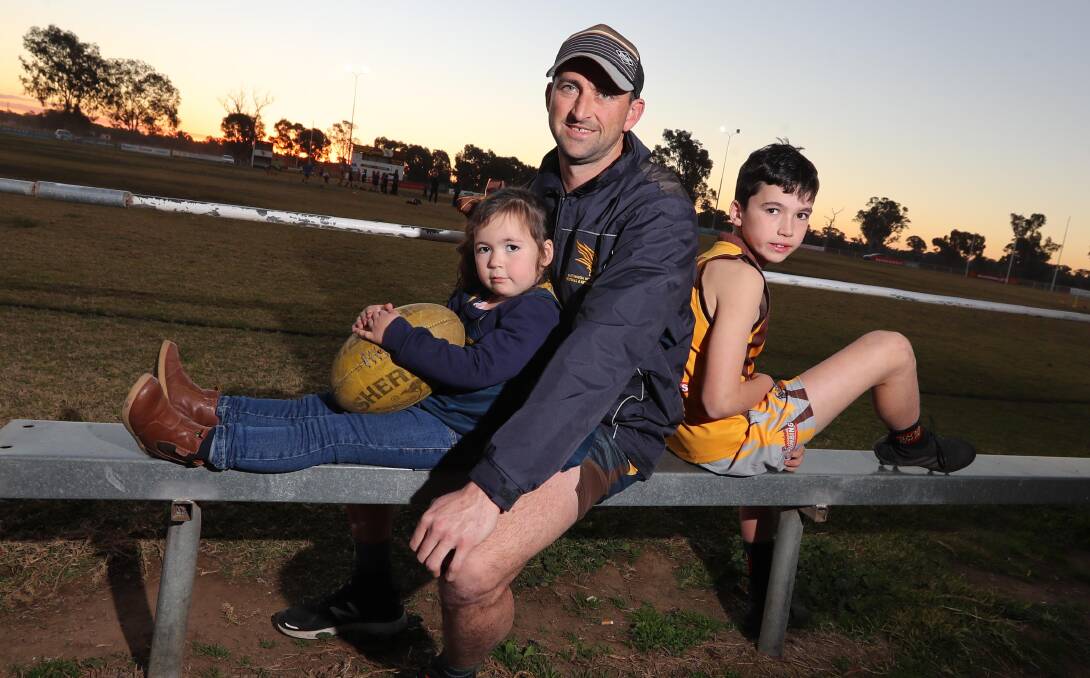 Brenton Roberts at training last year, with daughter Olivia (then 3) and son Lucas (10), ahead of his record-breaking game for the club.