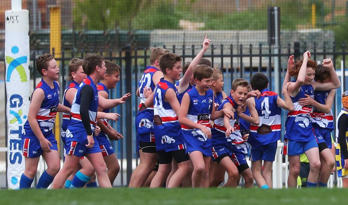 MEMORABLE DAYS: Turvey Park's grand final-winning under 12s celebrate the first of the club's clean sweep of junior football grand finals. Picture: Emma Hillier