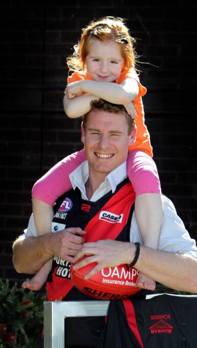 ALL SMILES: Geoff Spriggs and daughter Indie, 4. Picture: Les Smith