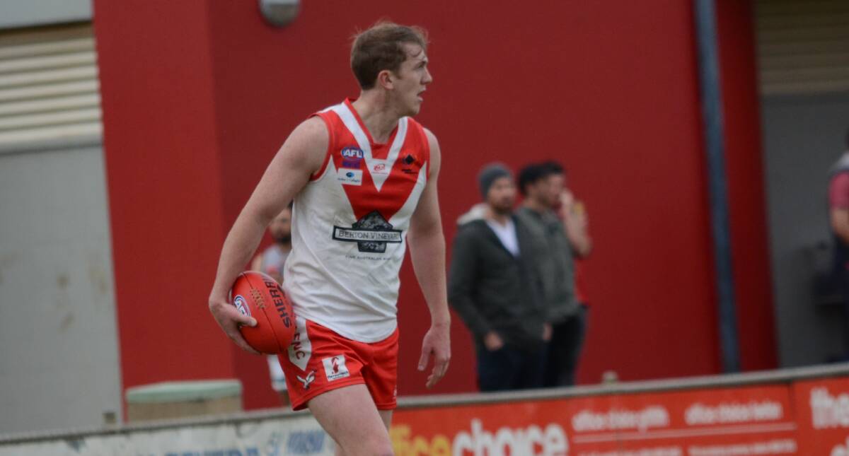 BACK HOME: Jacob Conlan playing for the Swans against Collingullie-Glenfield Park two weeks ago in what was to be a one-off appearance.