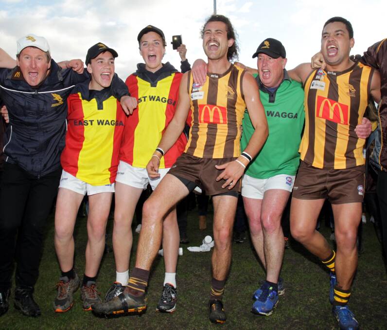 LEADING THE CHARGE: Brocke Argus (centre) and Chris Gordon (right) lead the East Wagga-Kooringal celebrations after the 2016 Farrer League grand final. Picture: Les Smith