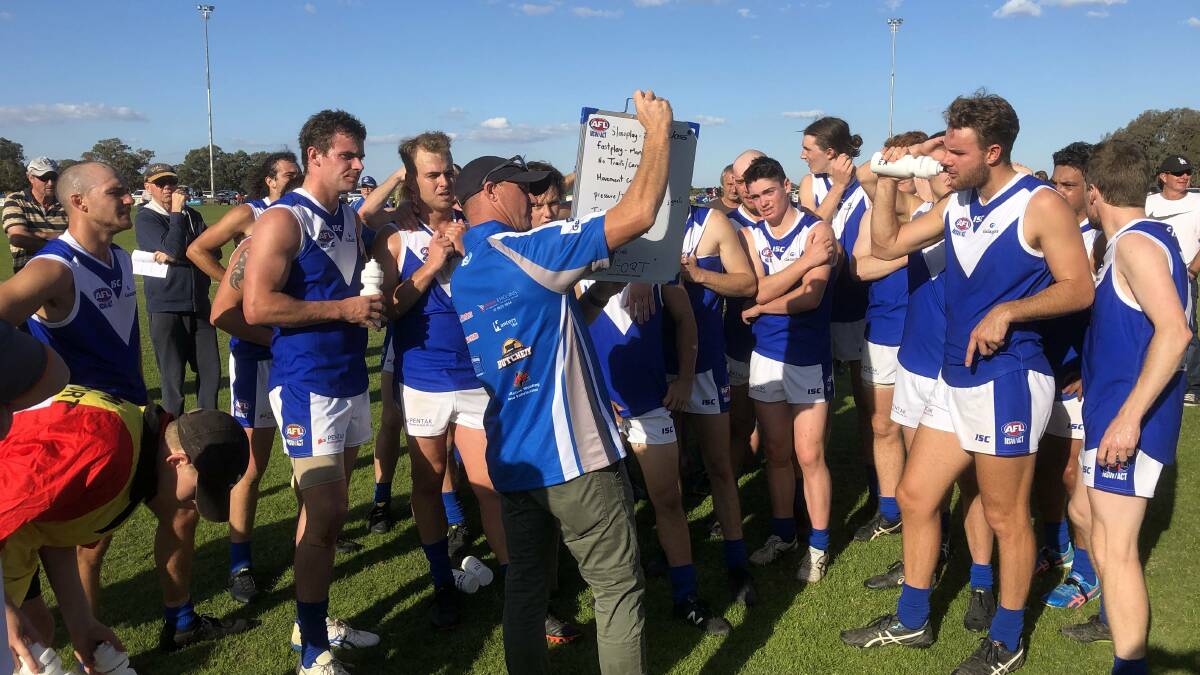 LAST ENCOUNTER? Farrer League rep coach Brad Aiken addresses the players at quarter-time in their thriller against the Hume League last May. Picture: Peter Doherty