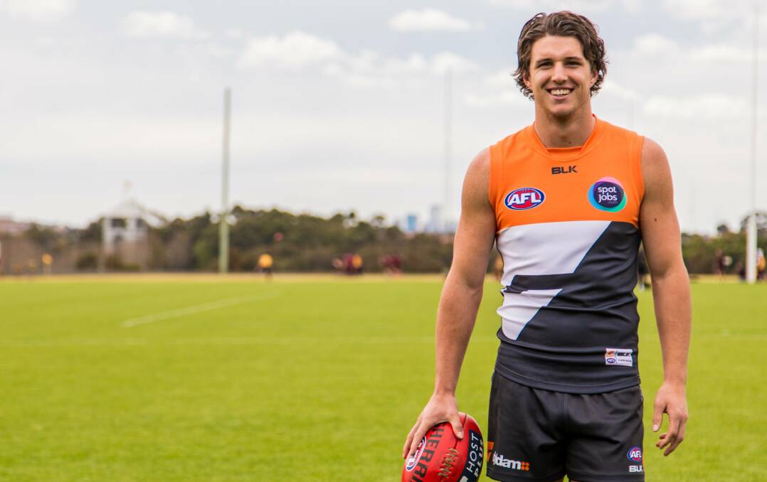 Jake Barrett in GWS colours after being named to make his AFL debut with the Giants in 2015. 