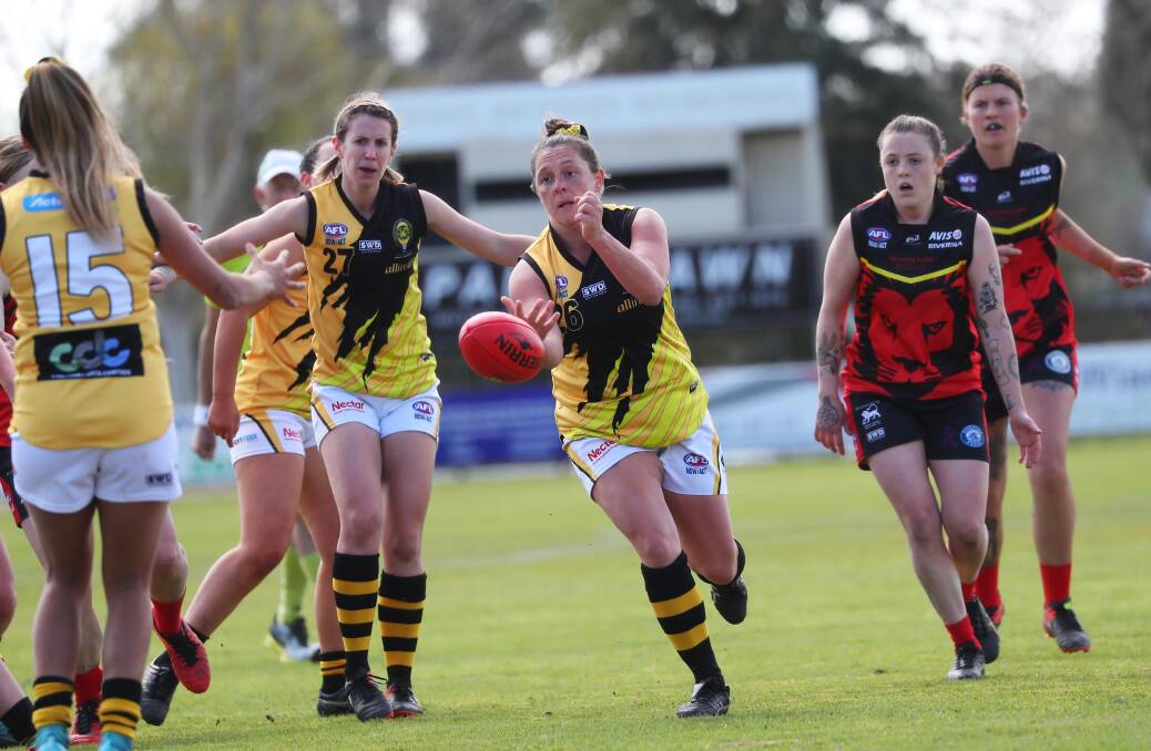 HOME FINAL: Queanbeyan Tigers and Riverina Lions in action at McPherson Oval in September when the Lions hosted the preliminary final of the AFL Canberra Women's division two competition. Picture: Emma Hillier