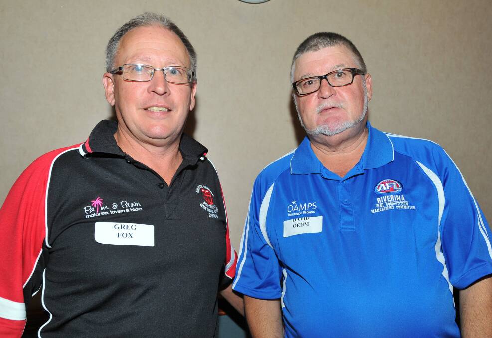 Greg Fox, left, with David Oehm who he has succeeded as Farrer League CMC president.