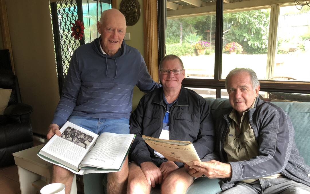FORMER TEAMMATES: Former Kangaroos (from left) Dave Mulrooney, Bob Elliott and Garry Hiscock get together and remember their 1969 season with Tommy Raudonikis. Picture: Peter Doherty