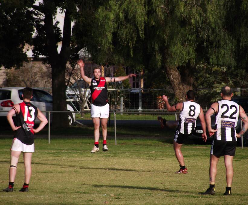 SHARP SHOOTER: The Rock-Yerong Creek's Andy Carey on his way to eight goals against Marrar earlier this year. Carey has kicked eight or more goals on four occasions this season. Picture: Peter Doherty