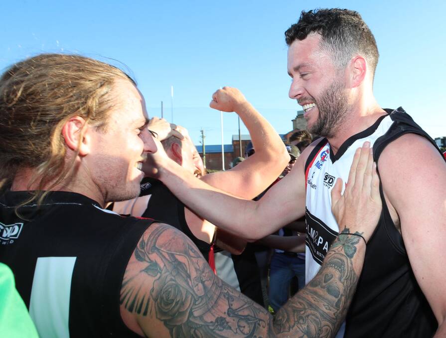 Forward/ruckman Jimmy Morris and teammate Jake May celebrate. Picture: Les Smith
