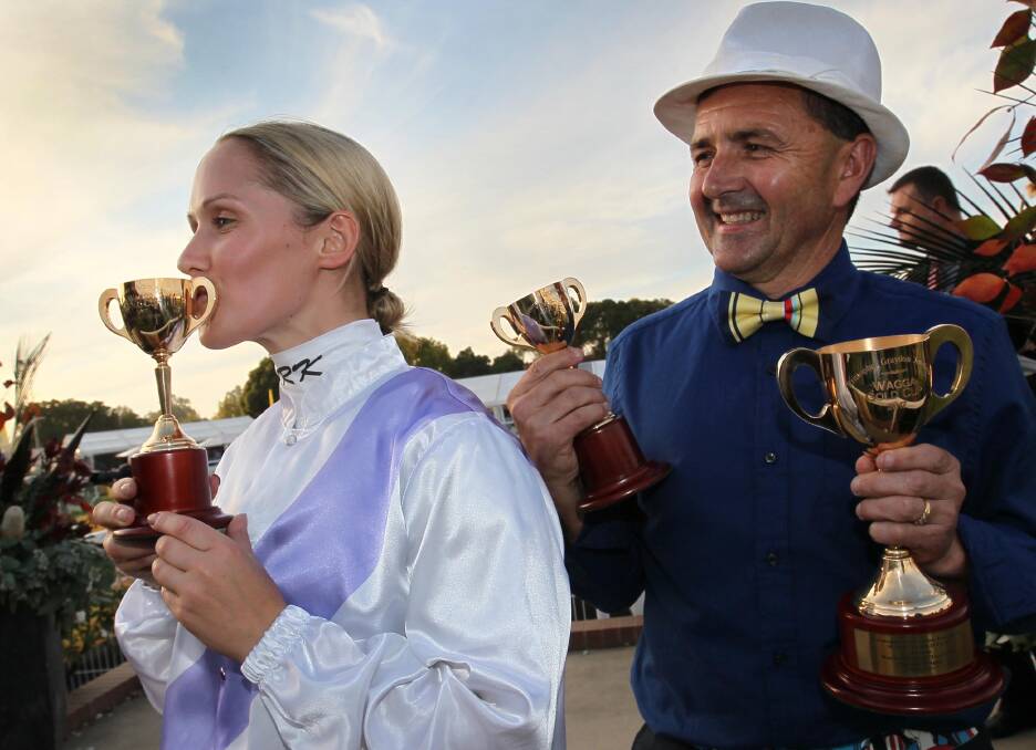 Jockey Rachel King and stable representative Neil Paine celebrate Stampede's success in 2017 for the Bott-Waterhouse team. Paine will bring Taikomochi to Wagga this year. Picture: Les Smith. 