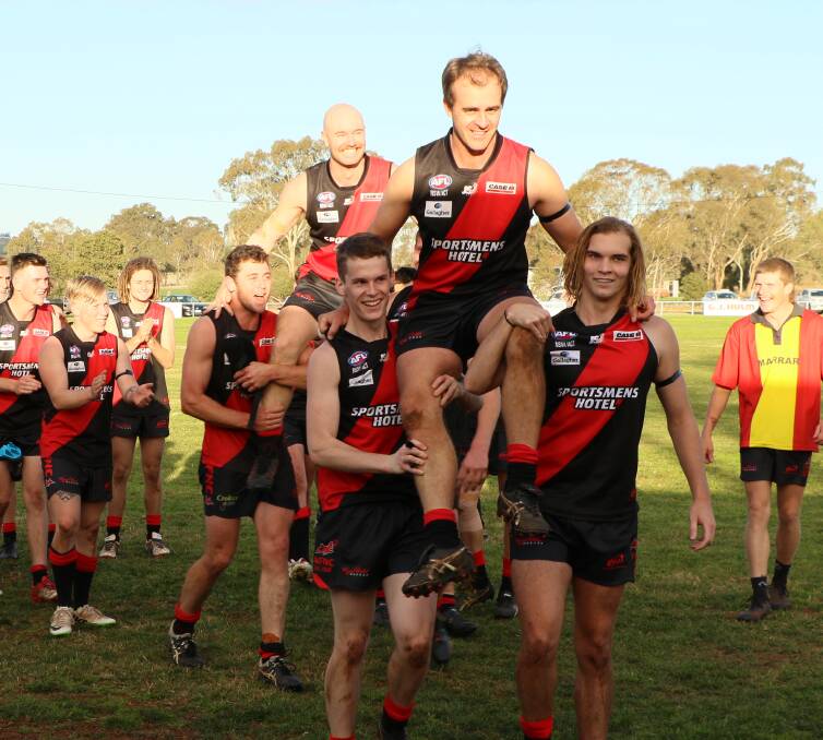 250 CLUB: Marrar's Mitch Taylor is chaired off in his 250th game for the Bombers, with Jeremy Graetz in tow, recognising his 150th. Pictures: Cathie Fox