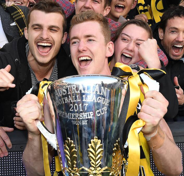 Jacob Townsend part of Tigers' premiership. Pictures: AAP