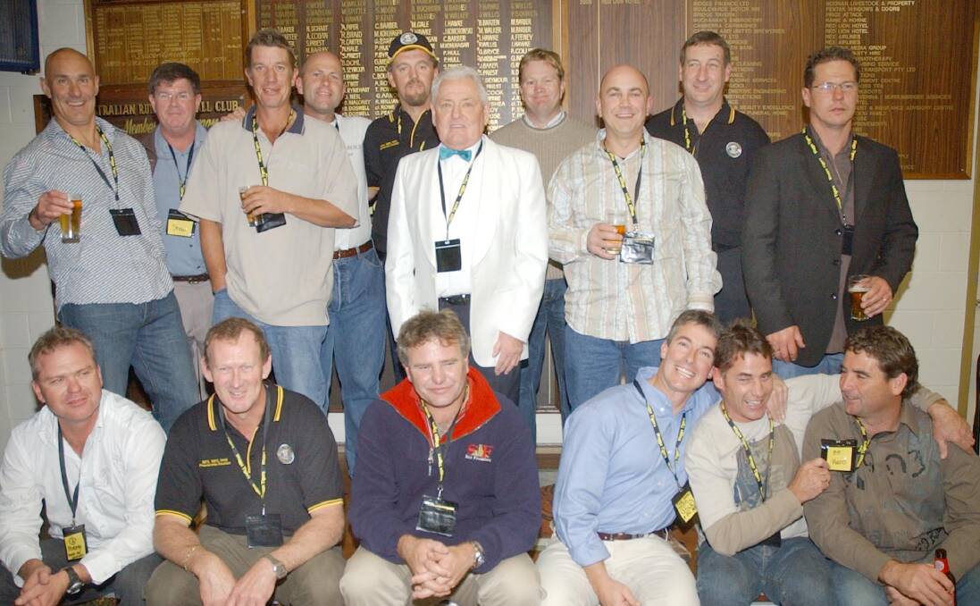 Former Tigers president Ron 'Wimpy' Barber (in the middle of the back row) at a 20-year reunion of the 1985 premiership.