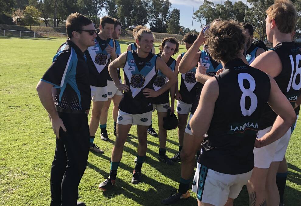 FINISHING UP: Departing Northern Jets coach Mitch Robinson addressing his players at quarter-time against North Wagga early in the year. Picture: Peter Doherty