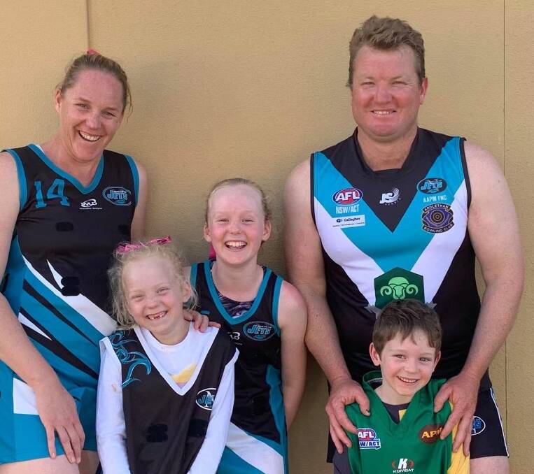 GAMES GALORE: Northern Jets' 200-gamer Caroline O'Brien with husband Ged (300 games) and daughters Grace, 10, Annabelle, 8, and Sam, 6.