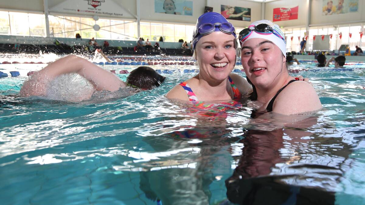 Emily started teaching Gretta to swim 11 years ago, as a five-year-old. Picture: Les Smith