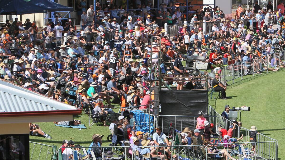 The crowd at Narrandera Sportsground for the GWS v West Coast pre-season game in 2017. The Eagles went on to win the 2018 AFL premiership. Could the Giants make it a double?