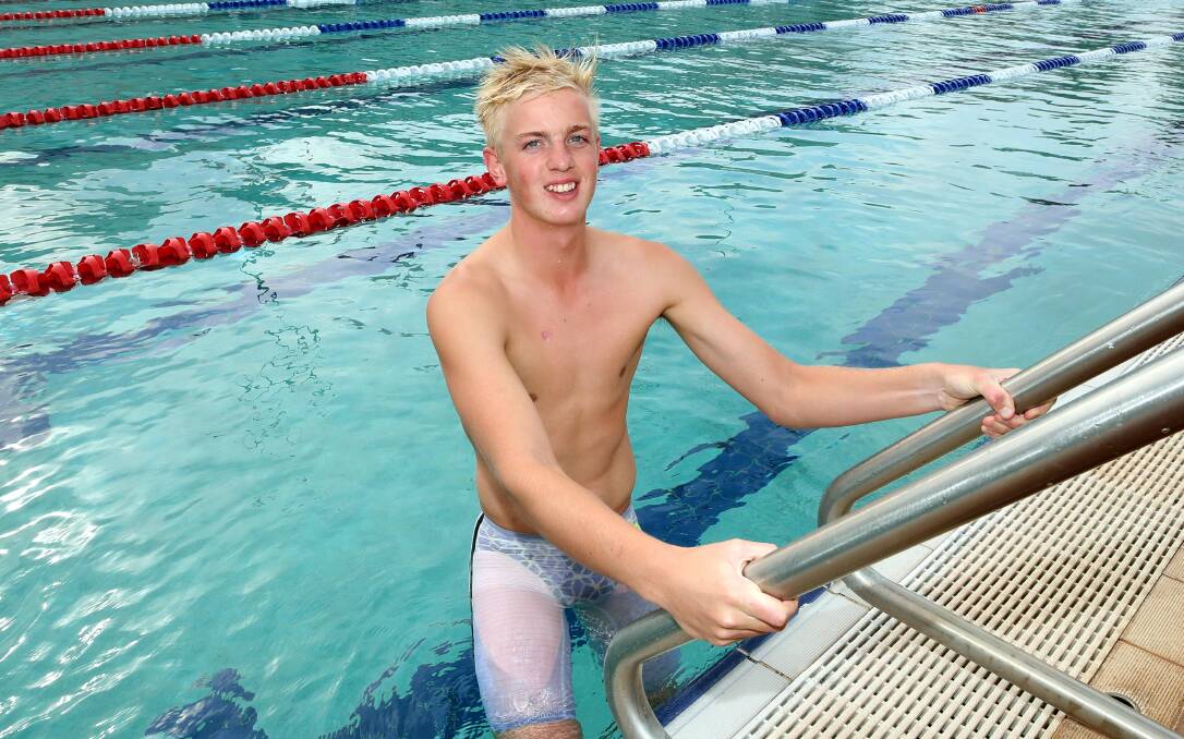 RECORD BOOKS: Mater Dei Catholic College's Jamie Mooney broke three individual records, including one that had stood since 1975. Pictures: Les Smith