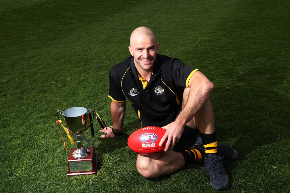 Shaun Campbell with the new AFL Riverina Championship trophy. There's a new best-on-ground medal named in honour of Norman Francis McLennan, a foundation Turvey Park footballer and multiple premiership player. 