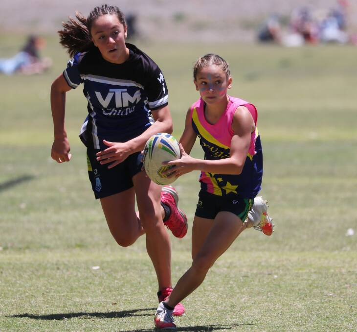 ON HOLD: Jordyn McFadden on the move in the Wagga Touch junior grand finals last December. This year's seasons are on hold. Picture: Emma Hillier