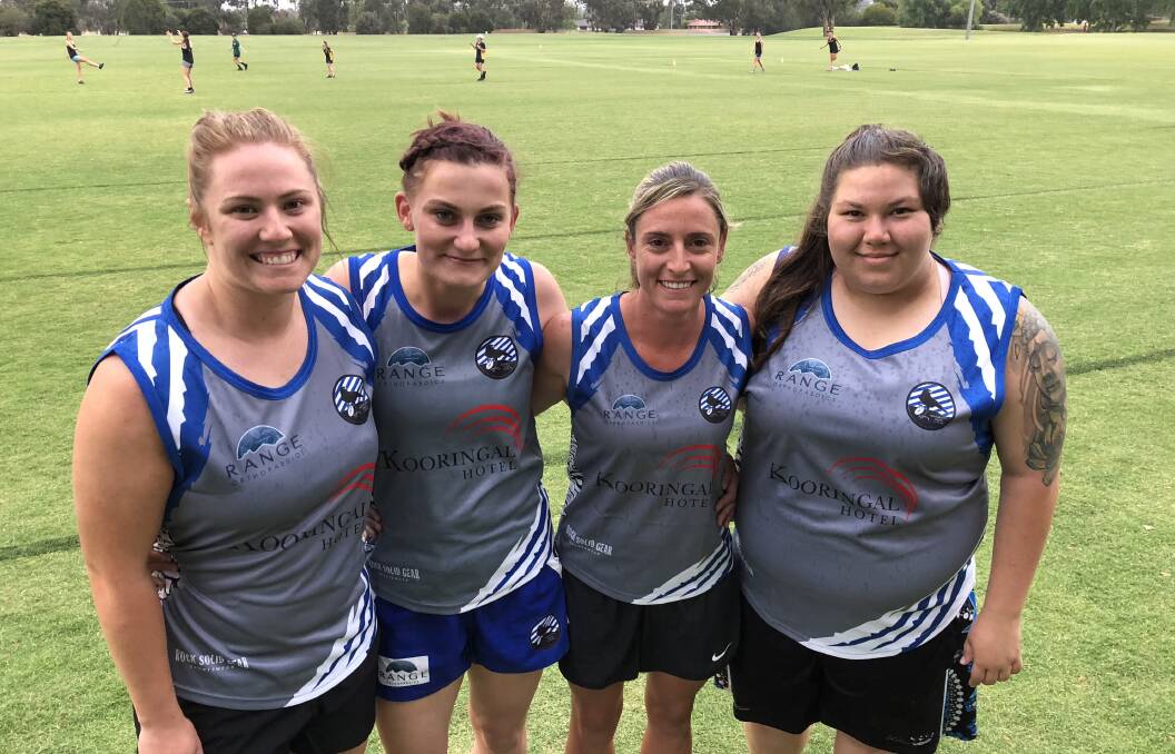 IN TOUCH: Wagga City women's players Jess Callaghan, April Sharp, Kellie Allcorn and Jess Burgess ahead of their game at Jubilee Park on Tuesday night. Picture: Peter Doherty