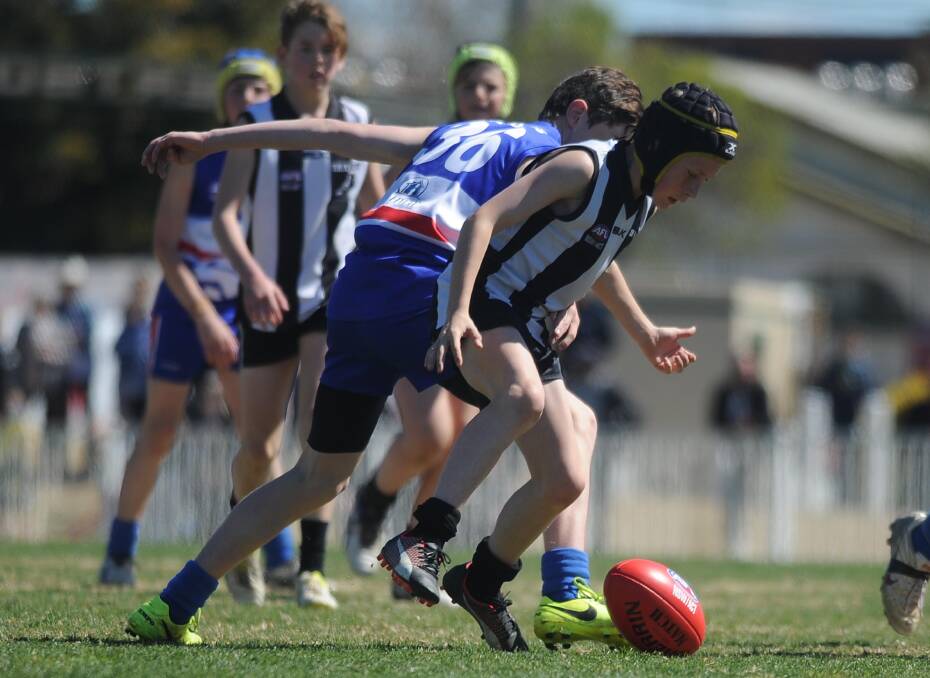 JUNIORS QUESTIONS: The Rock-Yerong Creek take on Turvey Park in last year's under 13s grand final. 