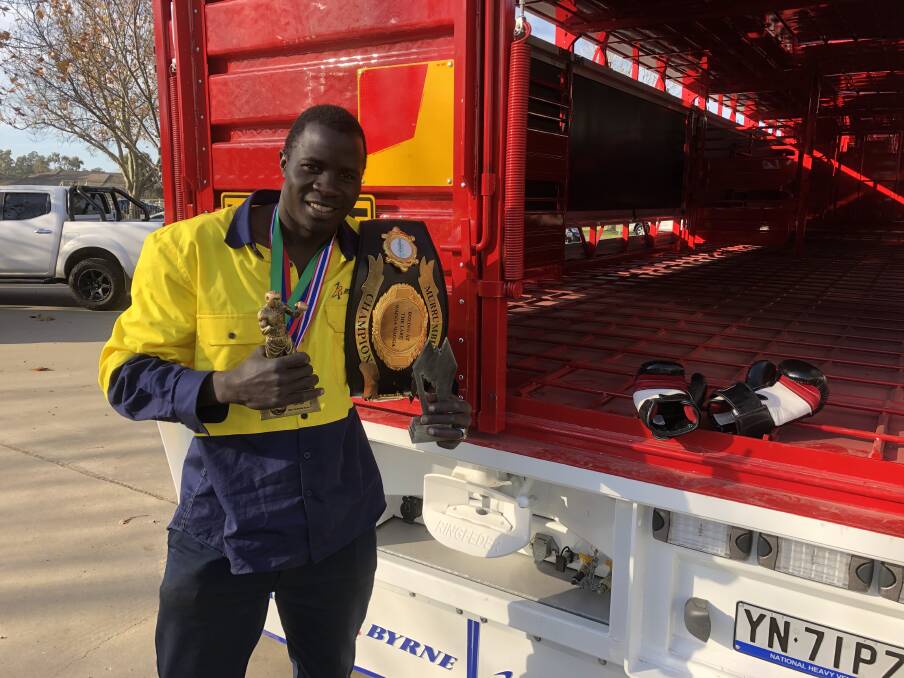 Simbwa at work at Byrne Trailers, where some simply refer to him as 'The Champ'