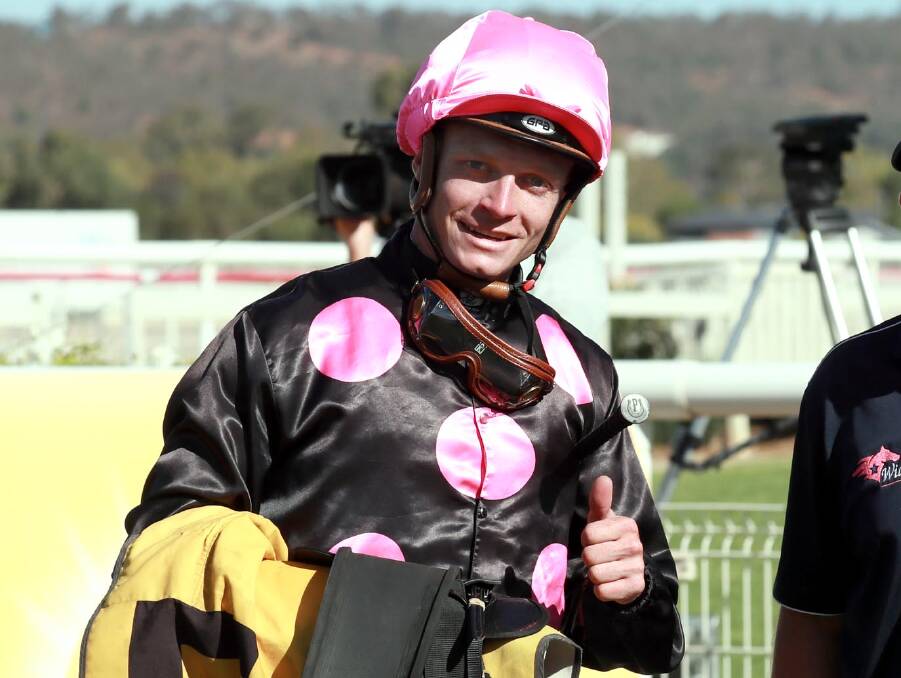 ON FIRE: Jockey Blaike McDougall after a win at Wagga earlier this year. He rode five winners in seven races at Gundagai on Saturday after a double on Friday. 