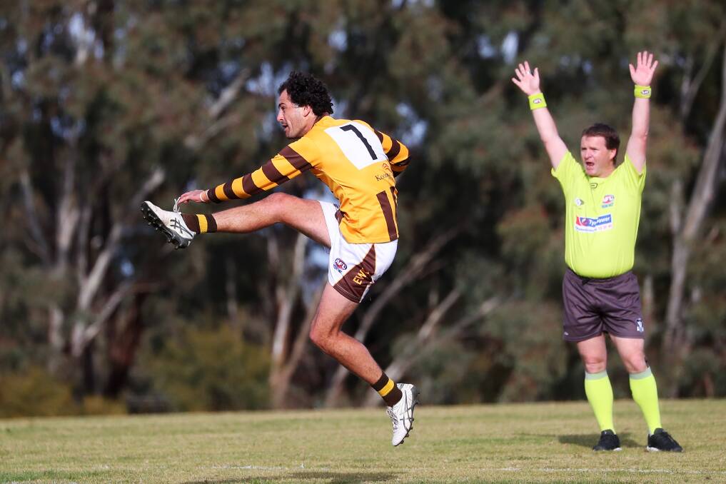 East Wagga-Kooringal captain Brocke Argus kicks in their hard-fought win against the Bushpigs at CSU. Picture: Emma Hillier