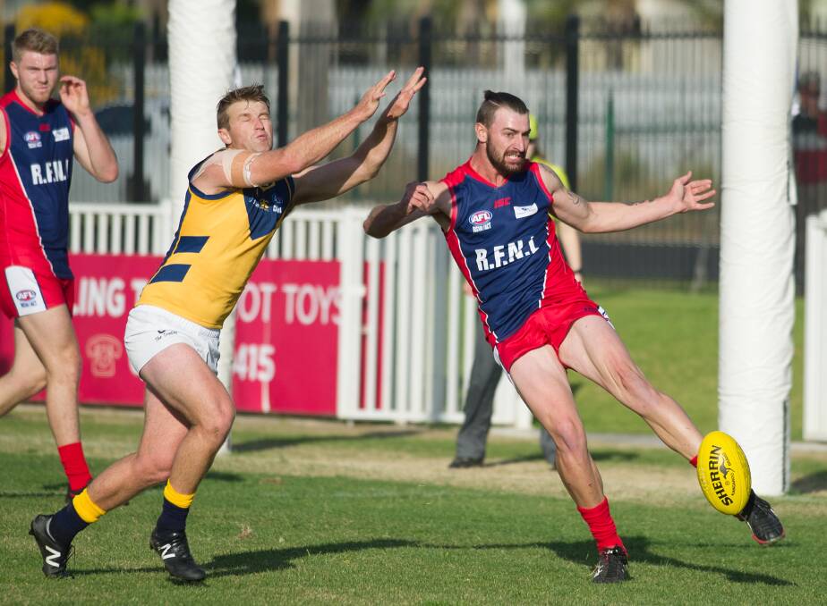 Photographer Laura Hardwick captures some of the representative football and netball at Robertson Oval on Saturday.
