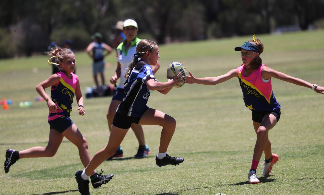 ROLLING FORWARD: Olivia Driscoll in action in last year's under 12s girls grand final. Picture: Emma Hillier