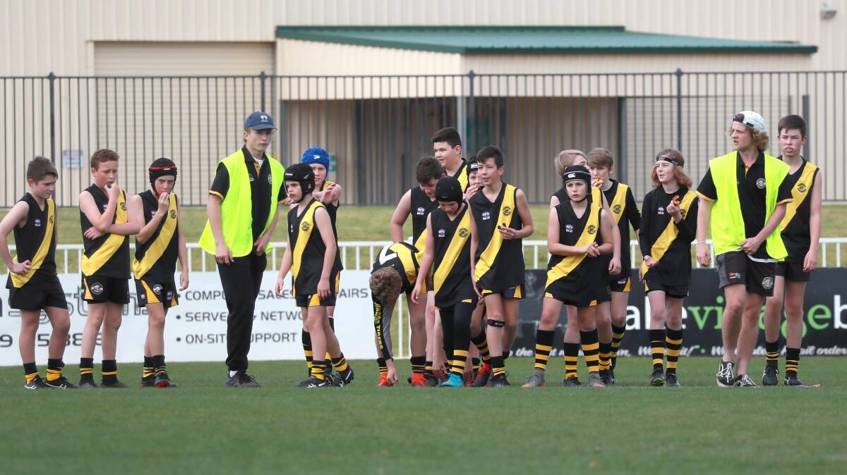 The coaches put their young Tigers through their preparation on Sunday. 