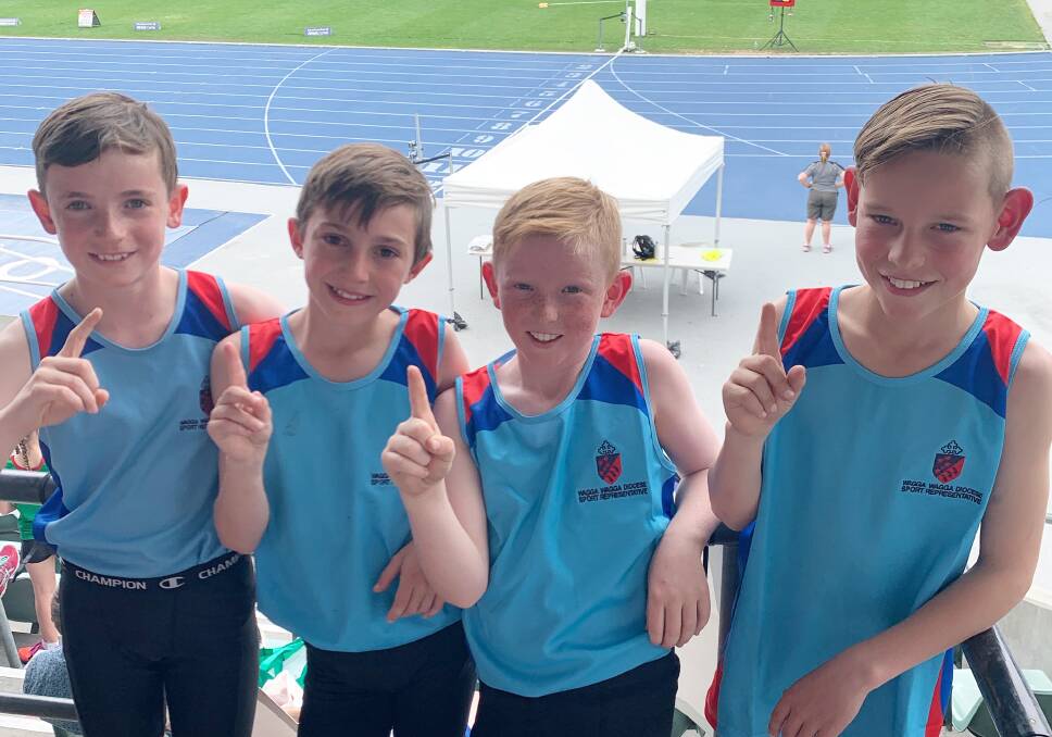 WINNERS ARE GRINNERS: Henschke's junior boys relay runners, Oliver Stout, Finn Anderson, Cooper Connelly and Will Foley. 