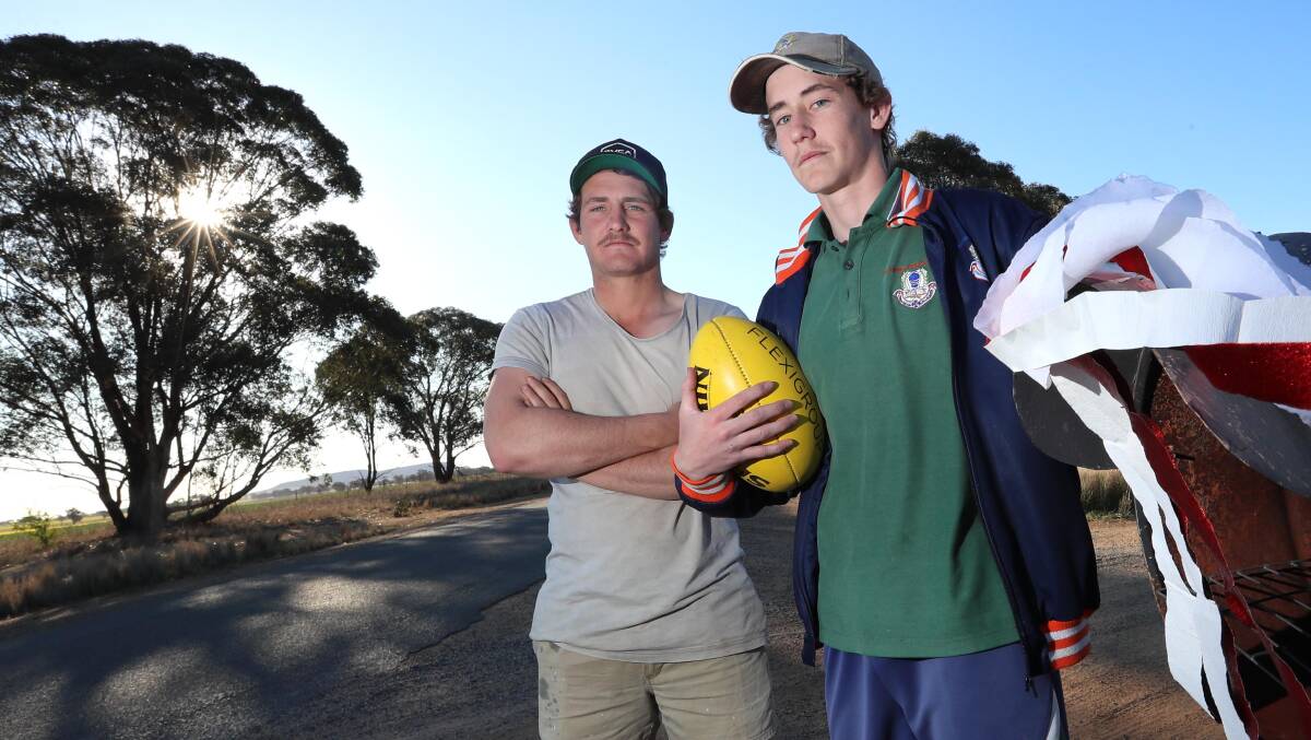 REGENERATION: Collingullie-Glenfield Park co-captain Nick Perryman (left) with younger brother Ed at home on the farm on Friday. Picture: Les Smith
