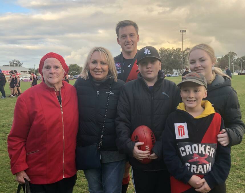HONOUR: Marrar's Chris O'Donnell with Margaret, Renee, Freddy, Clancy (front) and Annie Corbett, after he was awarded the Frank Corbett Medal for best-on-ground. 