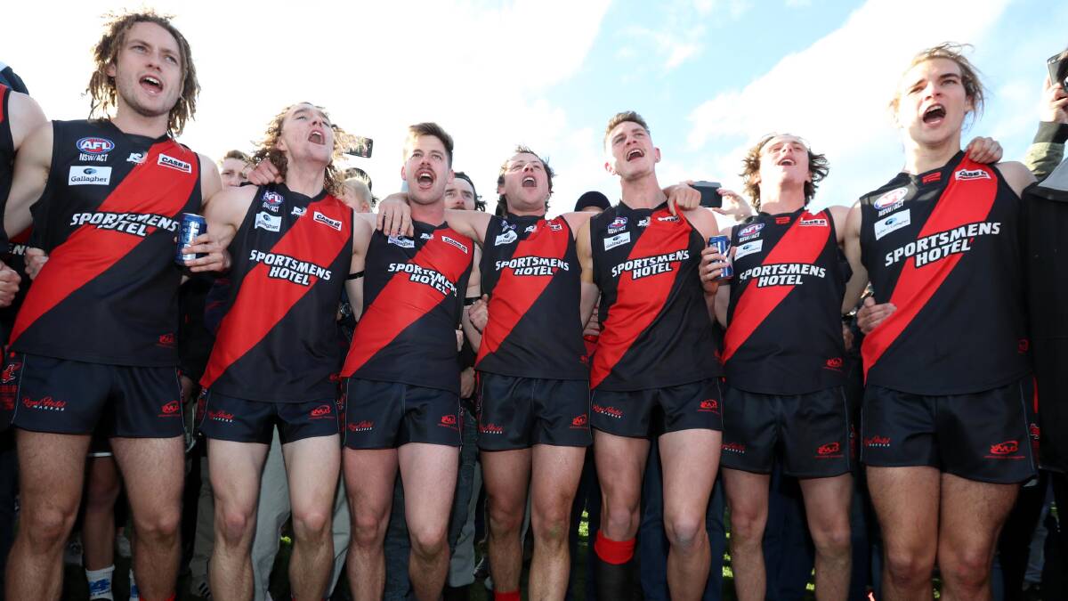 Adam Whyte (far right) celebrates his second senior premiership a week after turning 17.